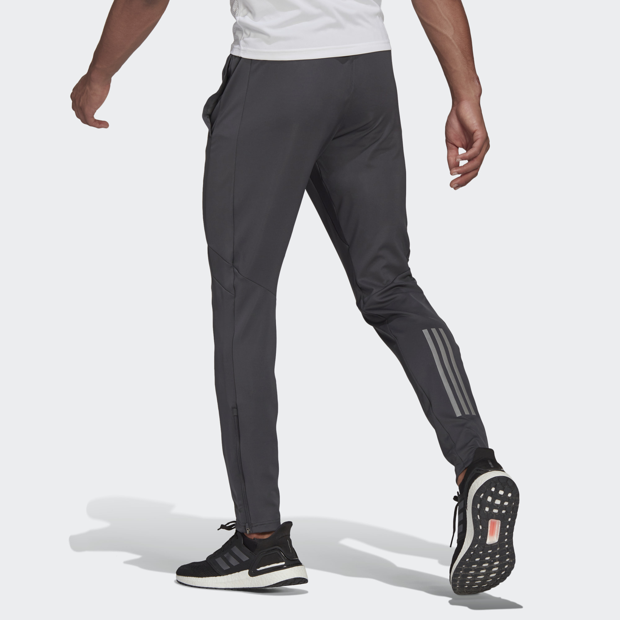 Брюки adidas own the Run Astro Wind Joggers